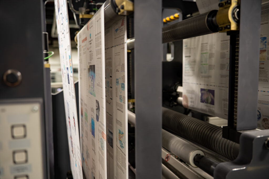 Close-up of high-quality 4-color sheetfed offset printing showing vibrant color accuracy and detail